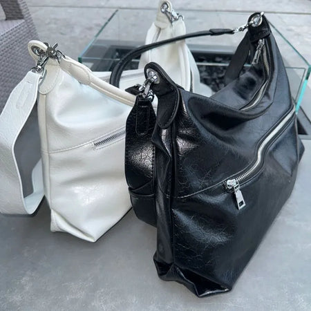Double zipper shoulder