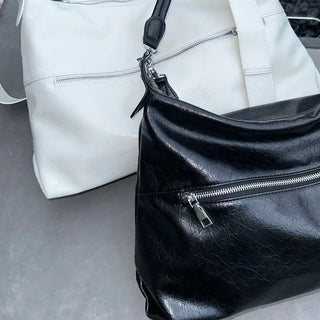 Double zipper shoulder