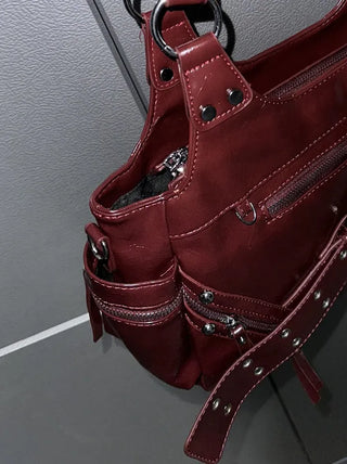 Taine Eyelet Belt Crack Vintage Shoulder Bag