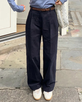 Wide cotton slacks with pleats