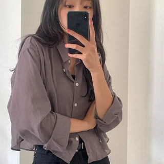 Loose-fitting sheer shirt