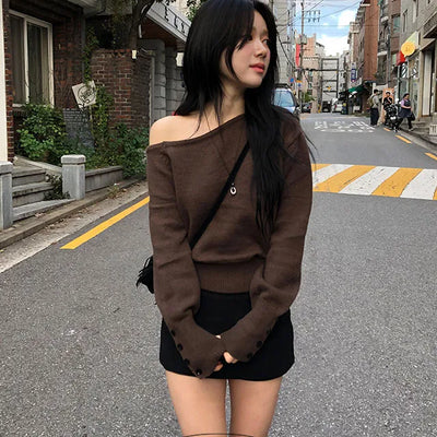 Rib embellished shoulder sleeve button knit