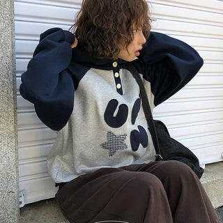 Fish patch and contrast button hoodie