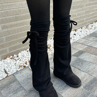Strap shirring point leg warmers