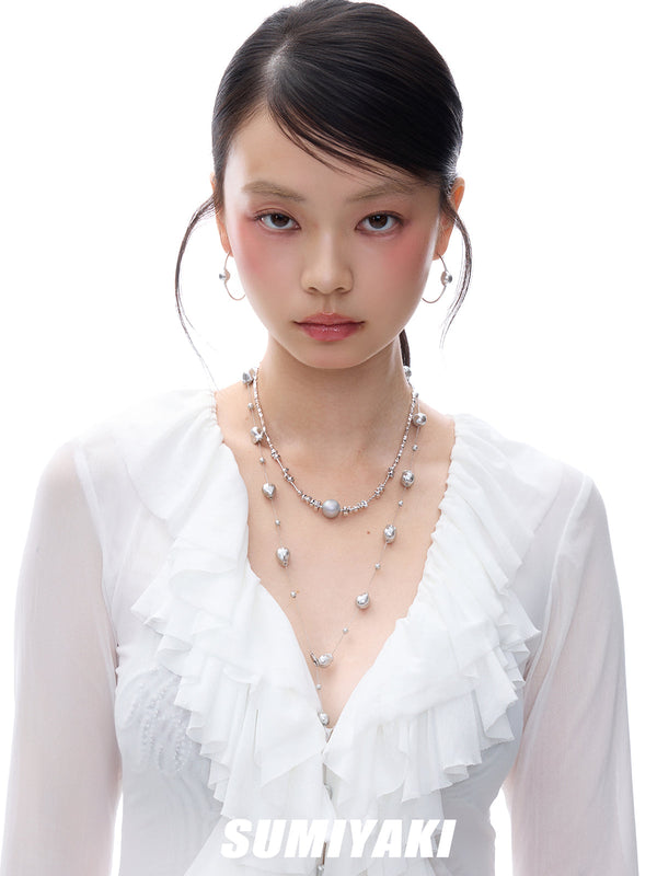 broken pearl necklace