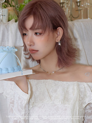 bow pearl earrings