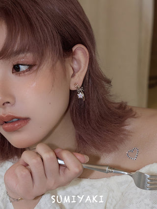 bow pearl earrings