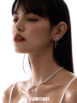bow tassel earrings