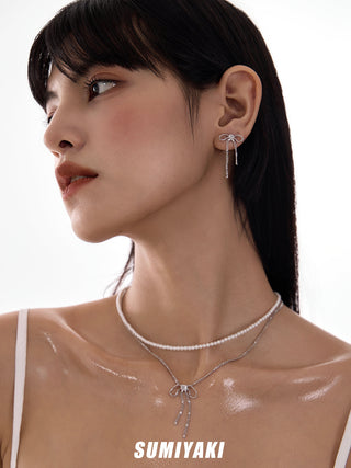 bow tassel earrings