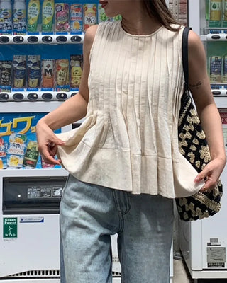 Pleated sleeveless blouse