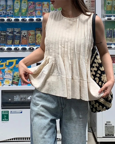 Pleated sleeveless blouse