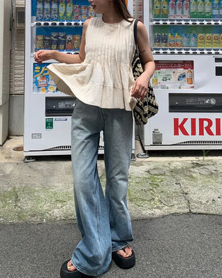 Pleated sleeveless blouse