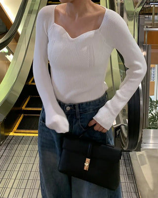 Wave neckline ribbed knit