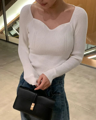 Wave neckline ribbed knit
