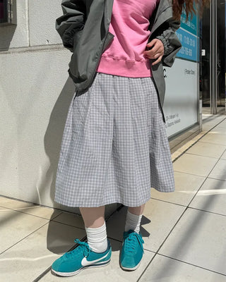 Checked pleated midi skirt