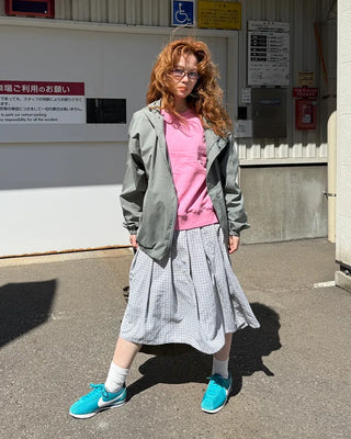 Checked pleated midi skirt