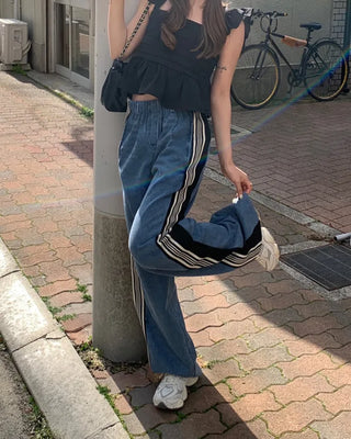 Triple side-stripe cutoff denim pants