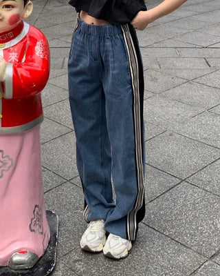 Triple side-stripe cutoff denim pants