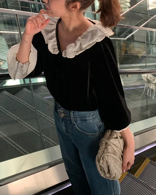 Frilled velvet blouse
