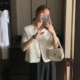 Linen short-sleeved jacket with gold buttons