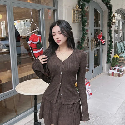 Delicate Flare-Sleeve Cardigan and Pleated Skirt Two-Piece Set
