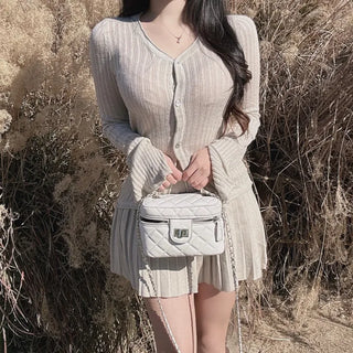 Delicate Flare-Sleeve Cardigan and Pleated Skirt Two-Piece Set