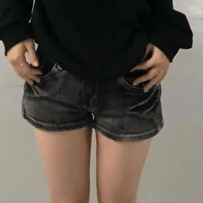 Vintage washed denim shorts with pocket details