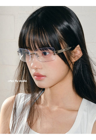 silver frameless glasses