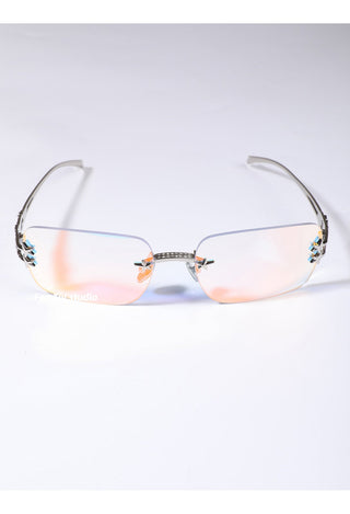 silver frameless glasses