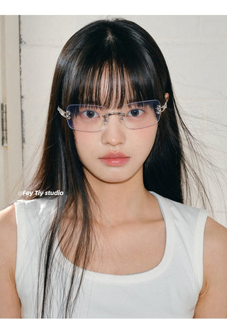 silver frameless glasses