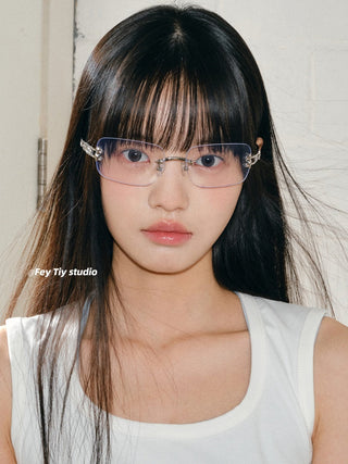 silver frameless glasses