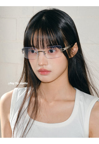 silver frameless glasses