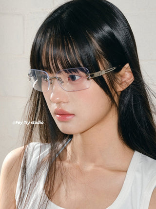 silver frameless glasses