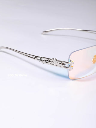 silver frameless glasses