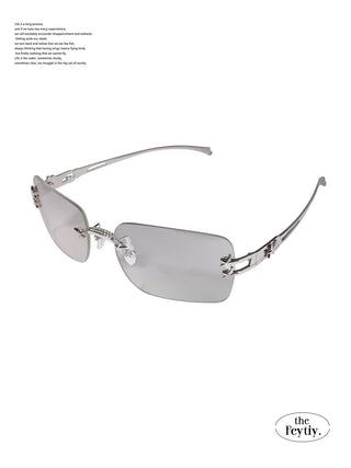 silver frameless glasses