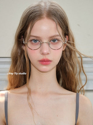 gold round glasses