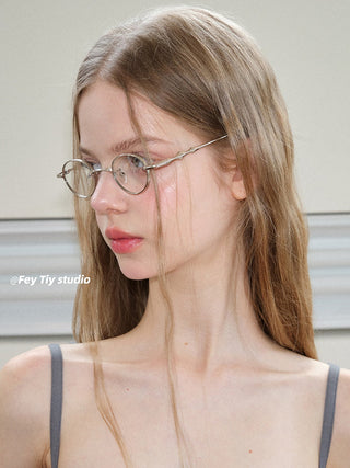 gold round glasses