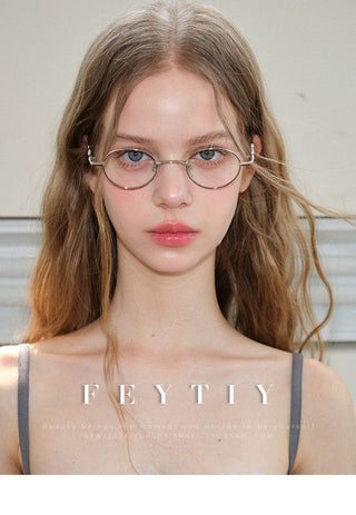 gold round glasses