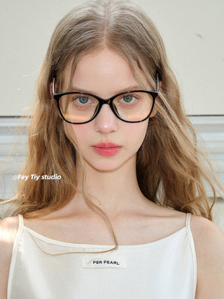 black thin-frame glasses