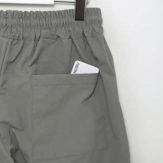 Two-pleat detail string pants