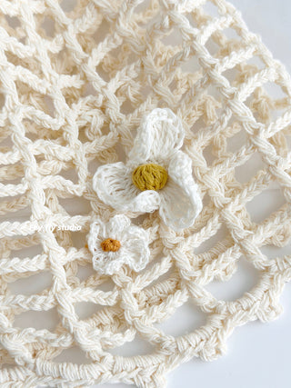 frangipani fishnet cap