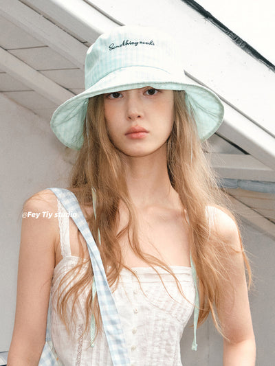 green bucket hat