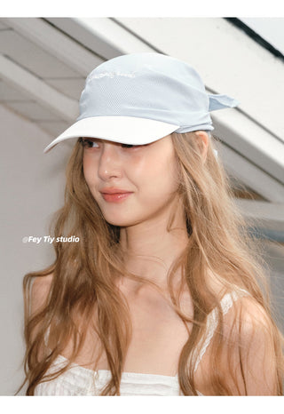 striped baseball cap