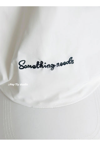 striped baseball cap