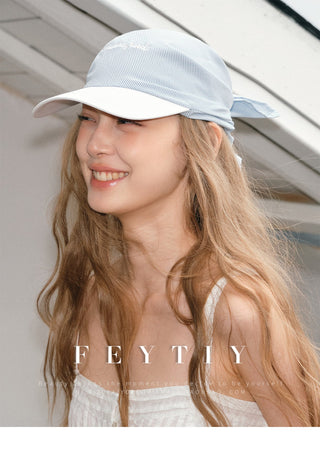 striped baseball cap