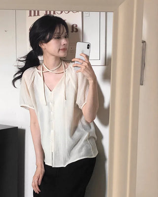 Strappy short-sleeved blouse