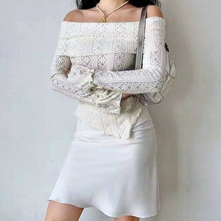 Hollow one-shoulder knitted top