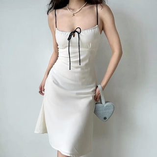 Strappy white mid-length hip dress