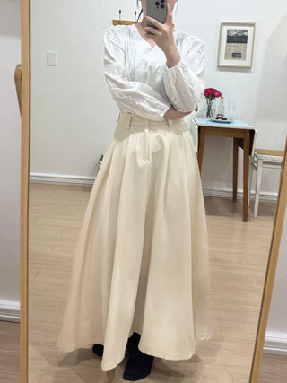 Nero Feminine Pintuck Flare Long Skirt