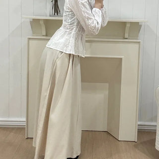 Nero Feminine Pintuck Flare Long Skirt